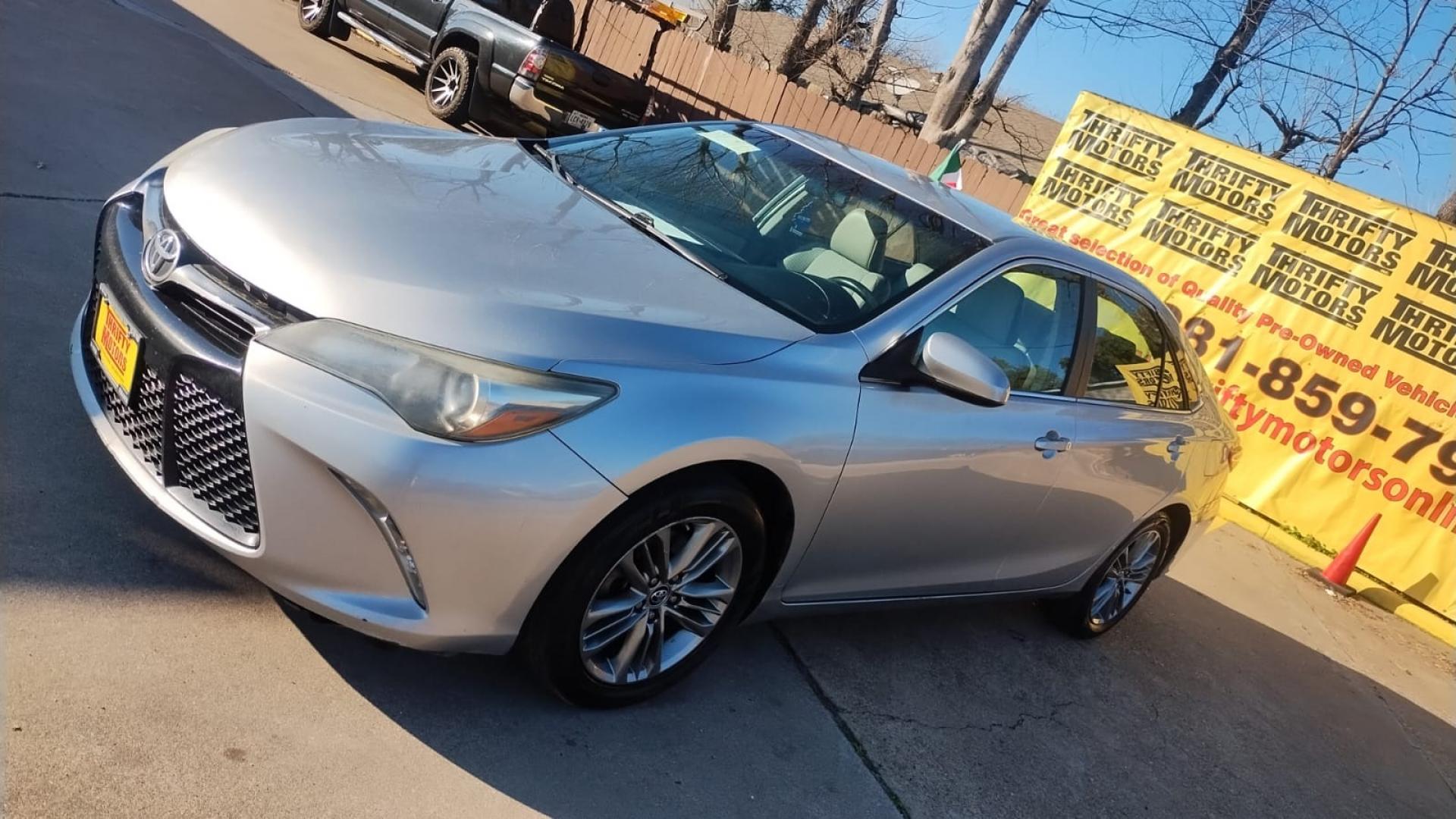 2015 Toyota Camry (4T1BF1FK4FU) , located at 16710 Clay Rd., Houston, TX, 77084, (281) 859-7900, 29.834864, -95.656166 - Photo#3